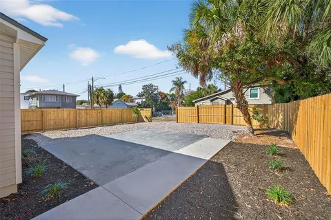 a view of a backyard with a small cabin