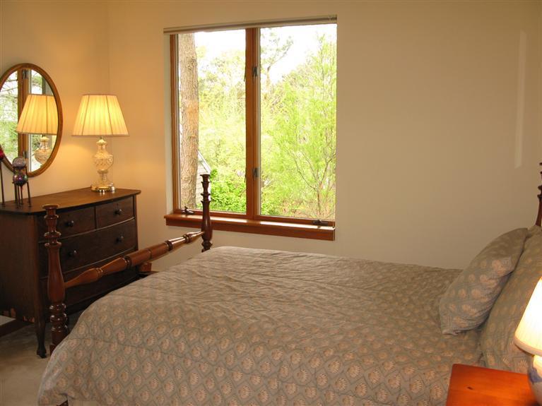20 Massasoit Road Wellfleet, MA 02667 - Photo 16 of 35 a bed room with a bed and a television