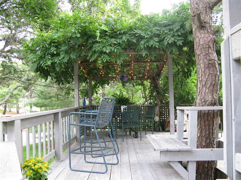 20 Massasoit Road Wellfleet, MA 02667 - Photo 22 of 35 a view of a chairs and table in the balcony