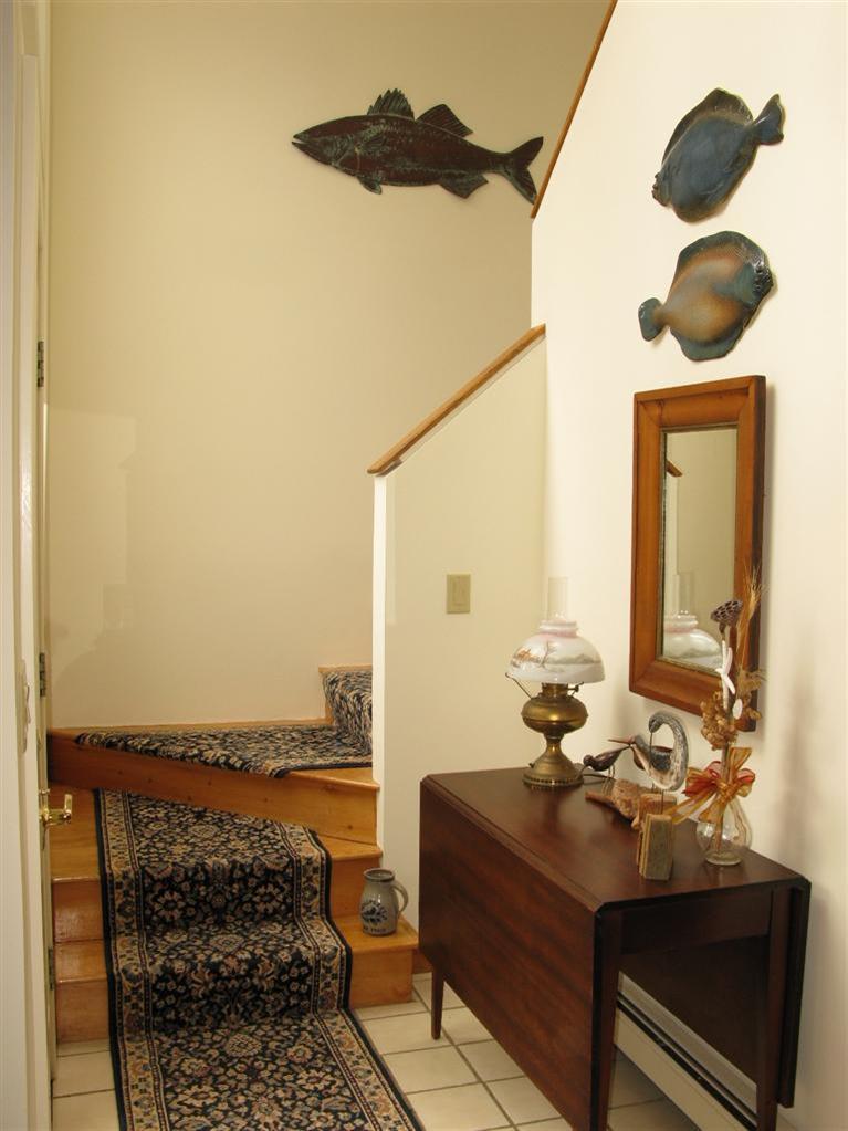 20 Massasoit Road Wellfleet, MA 02667 - Photo 9 of 35 a bathroom with a sink and a mirror