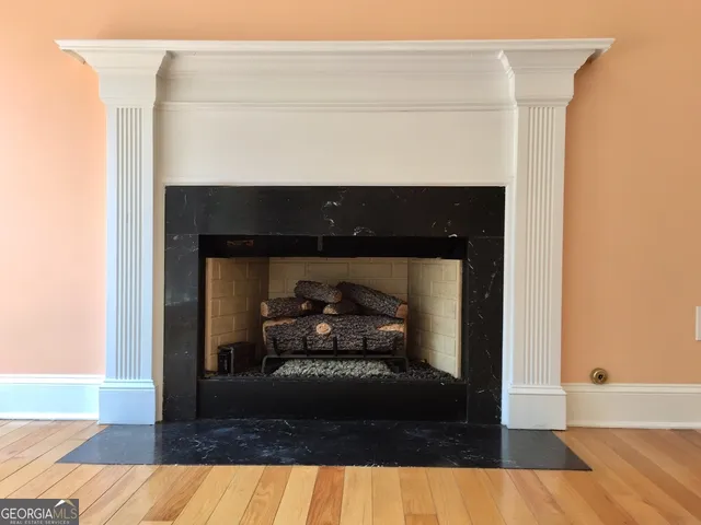 a living room with a fireplace