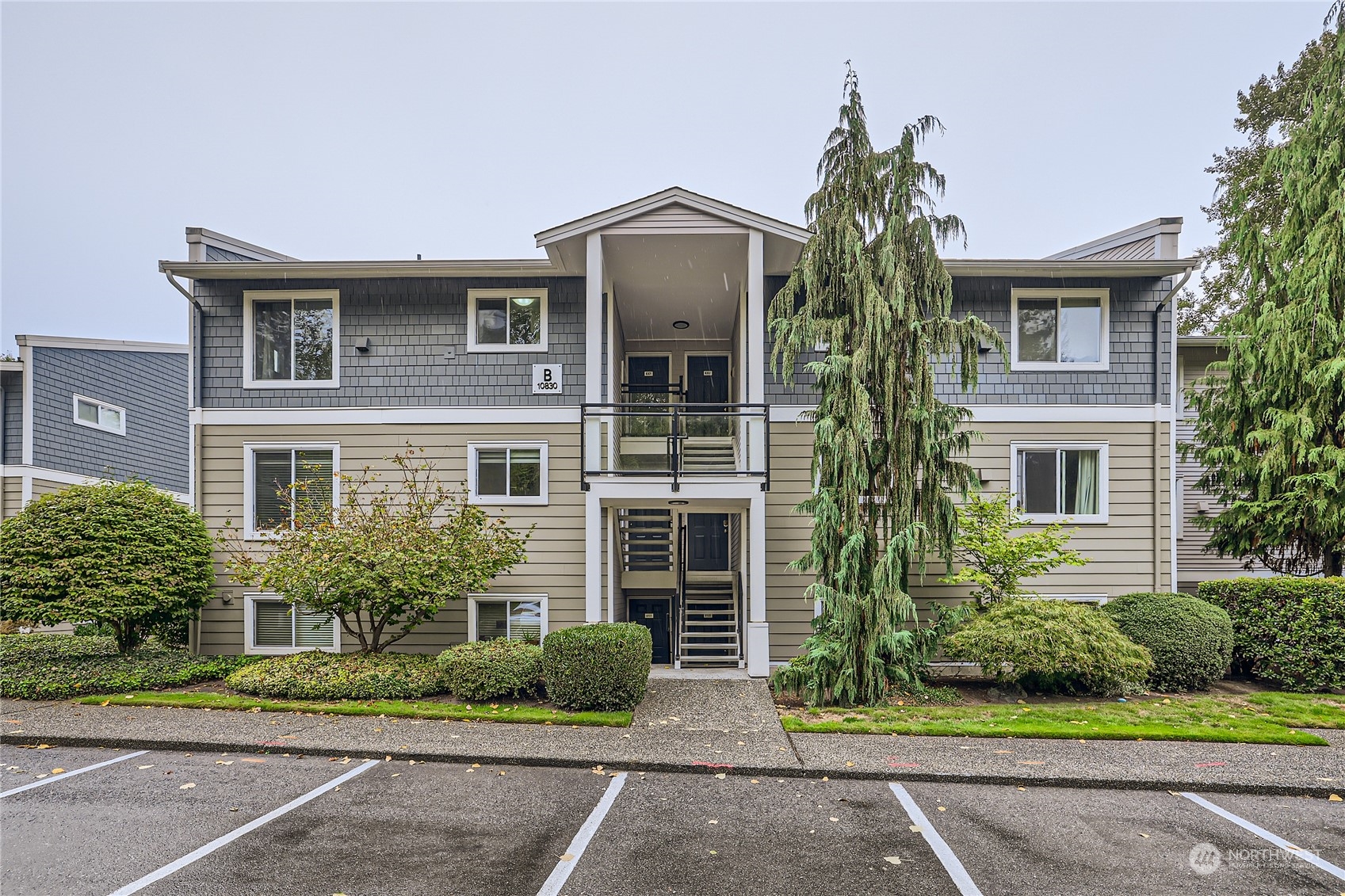 10830 East Riverside Drive, Unit B301 Bothell, WA 98011 - Photo 1 of 11 front view of a house