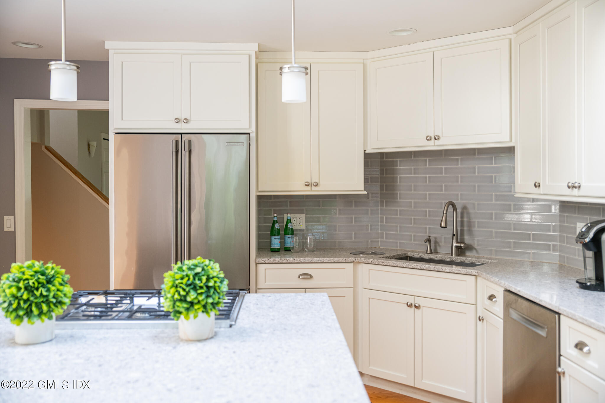 8 Verona Drive Riverside, CT 06878 - Photo 10 of 26 a kitchen with stainless steel appliances a refrigerator sink and cabinets