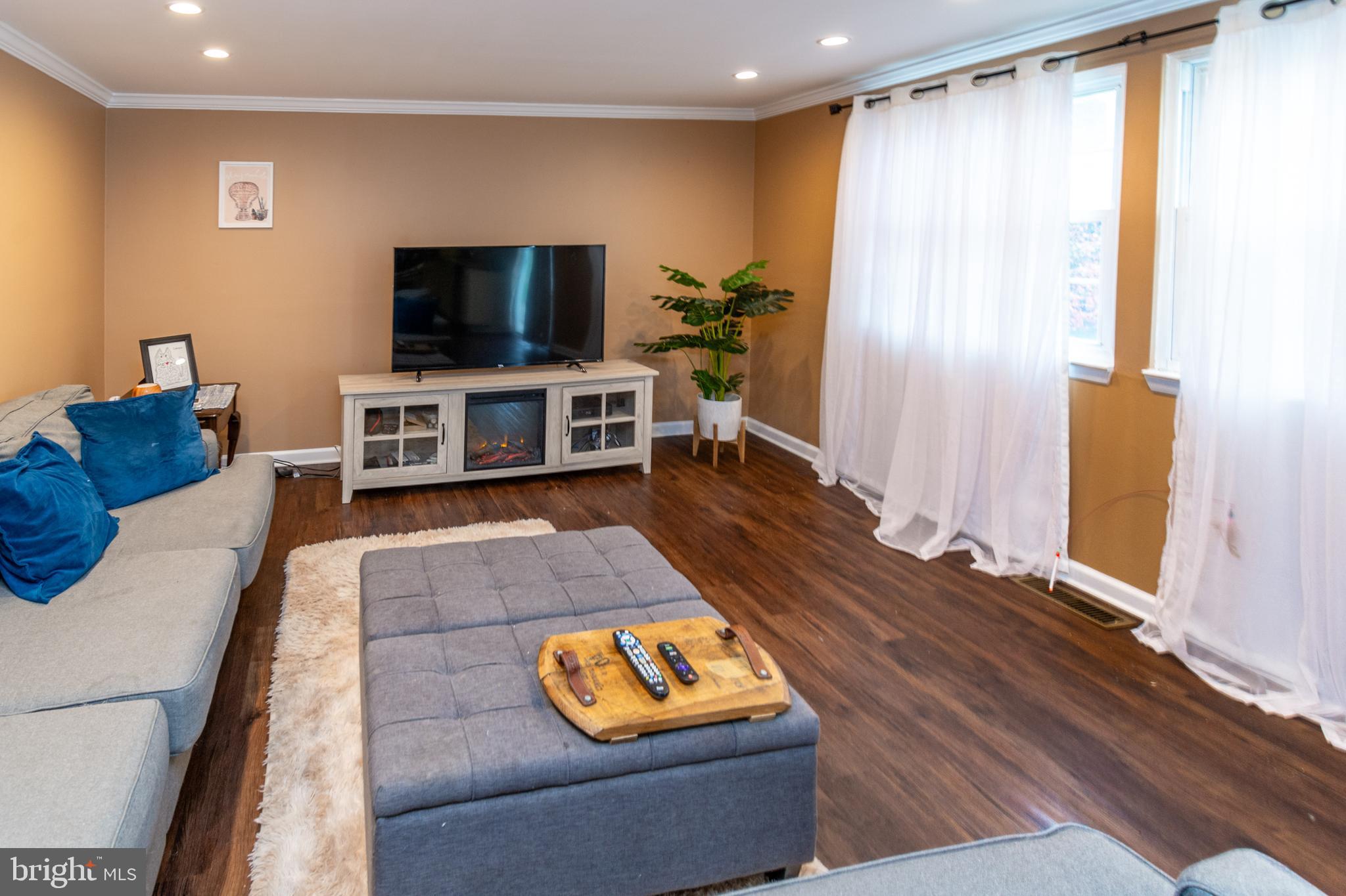 7 Pinehurst Court Hamilton, NJ 08690 - Photo 16 of 52 a living room with furniture and a flat screen tv