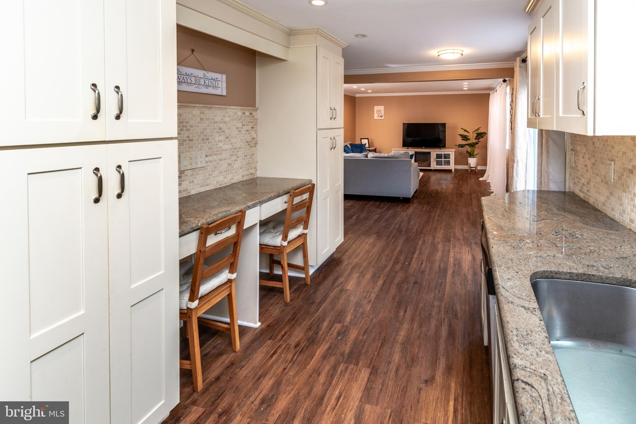 7 Pinehurst Court Hamilton, NJ 08690 - Photo 23 of 52 a living room with furniture and a wooden floor