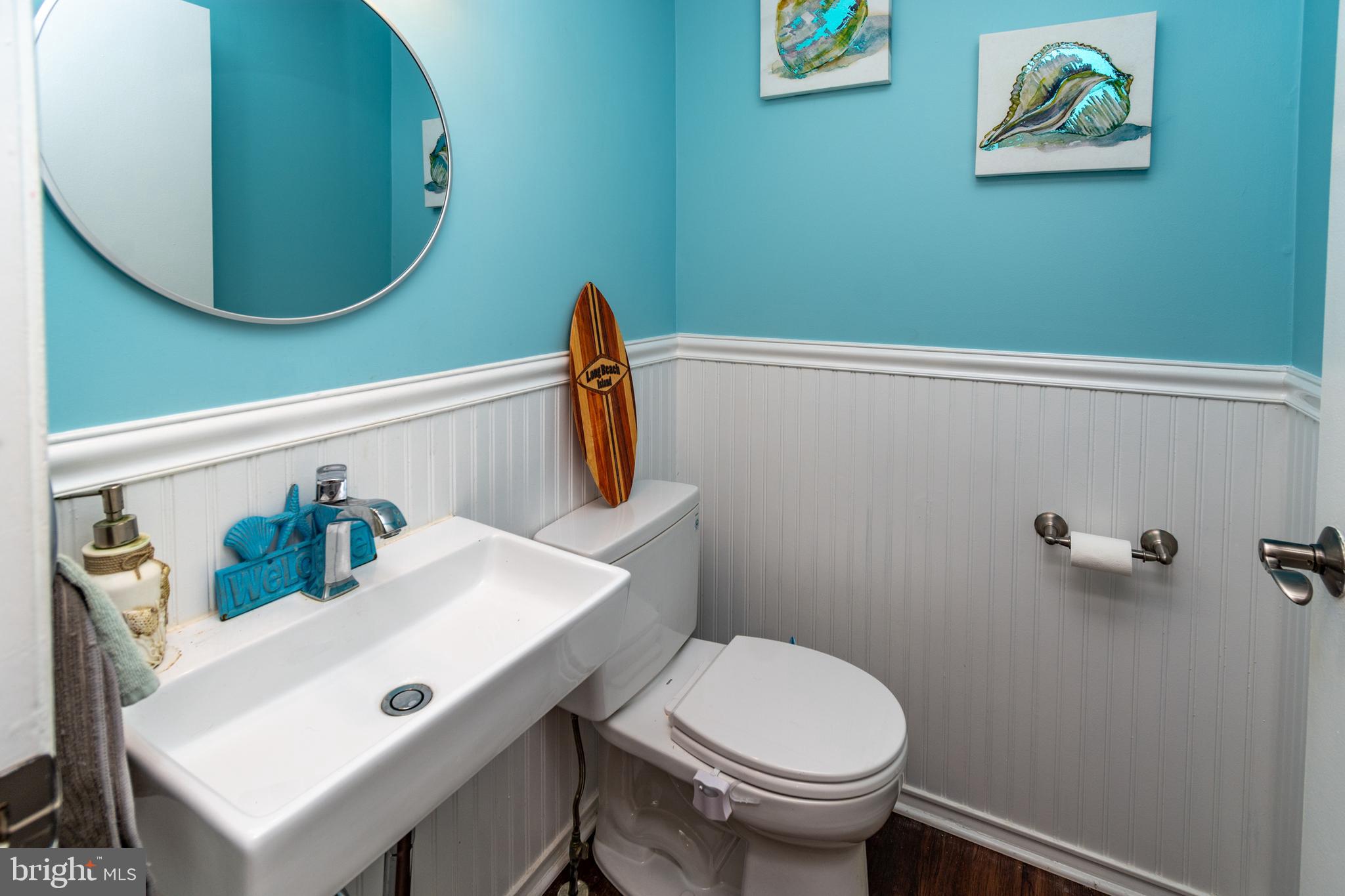 7 Pinehurst Court Hamilton, NJ 08690 - Photo 24 of 52 a bathroom with a toilet and a sink