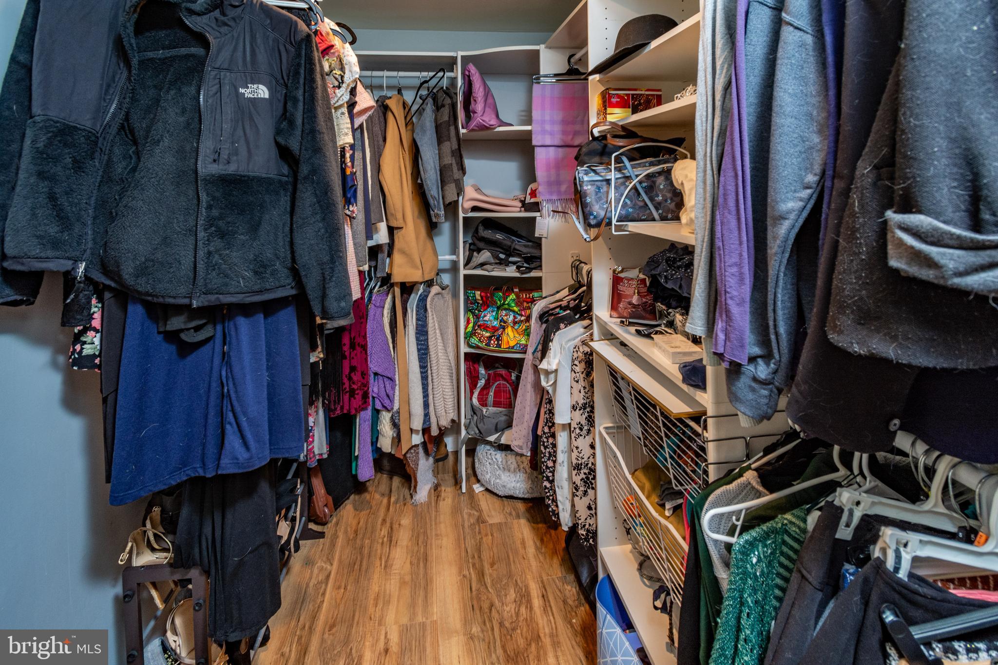 7 Pinehurst Court Hamilton, NJ 08690 - Photo 28 of 52 a view of walk in closet with clothes