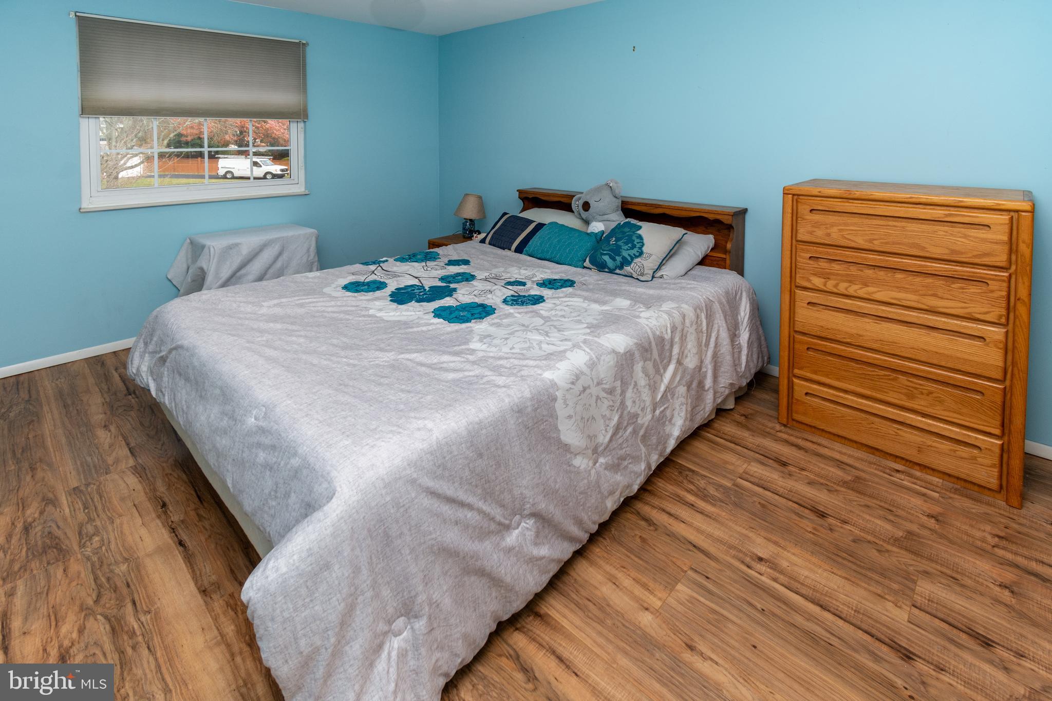 7 Pinehurst Court Hamilton, NJ 08690 - Photo 31 of 52 a bedroom with a bed and a night stand