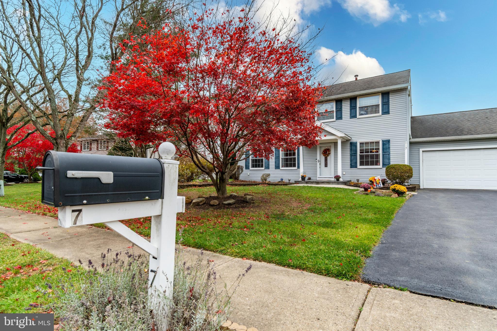 7 Pinehurst Court Hamilton, NJ 08690 - Photo 4 of 52 a front view of a house with a yard