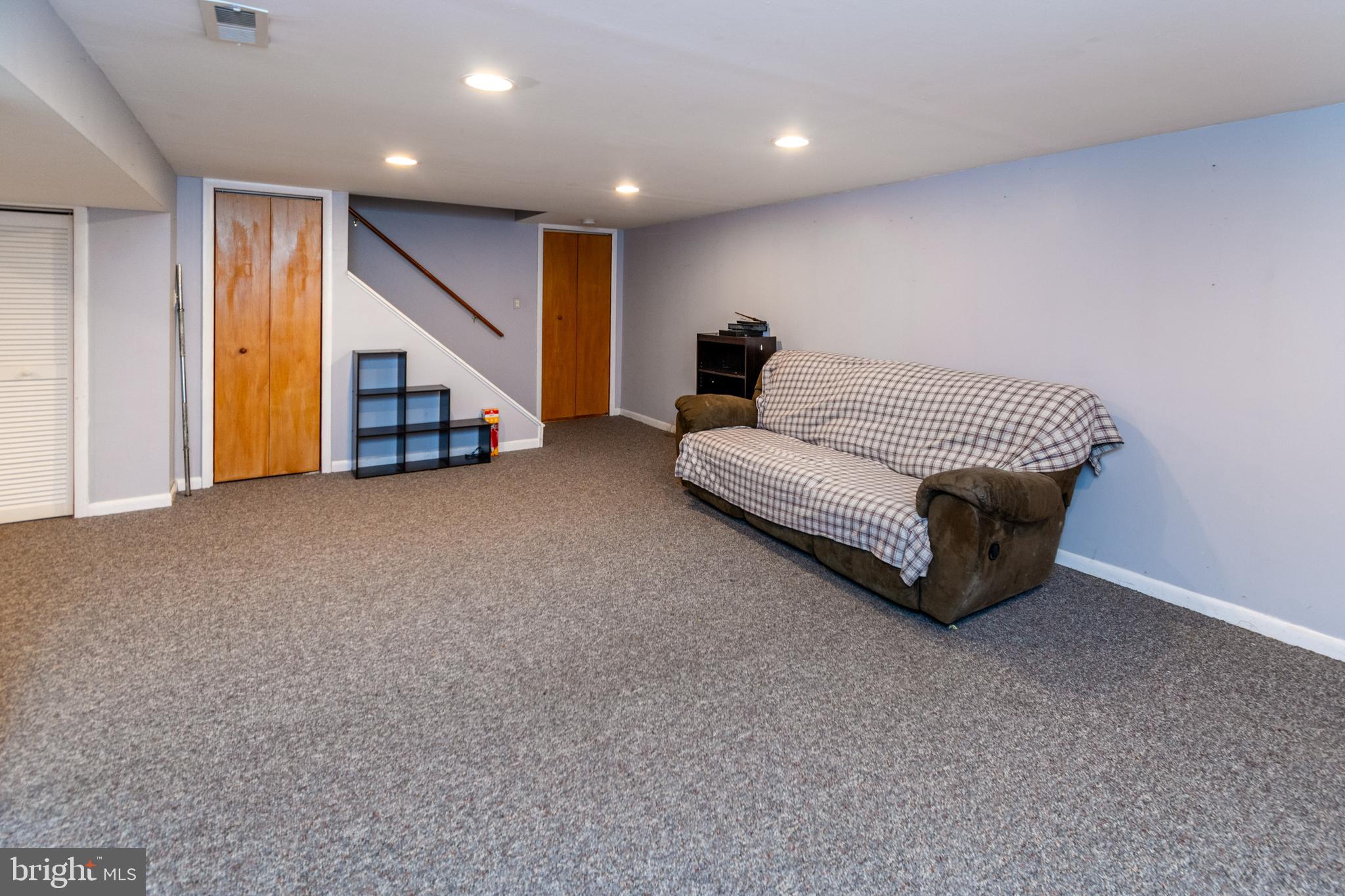 7 Pinehurst Court Hamilton, NJ 08690 - Photo 41 of 52 a living room with furniture and stairs