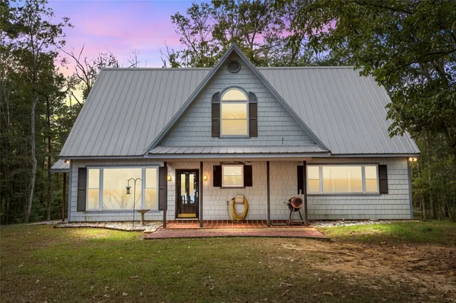 front view of a house with a yard