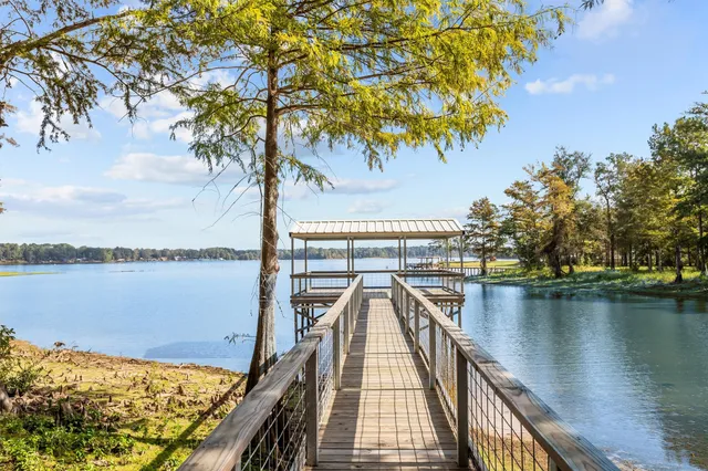 a view of balcony with wooden floor