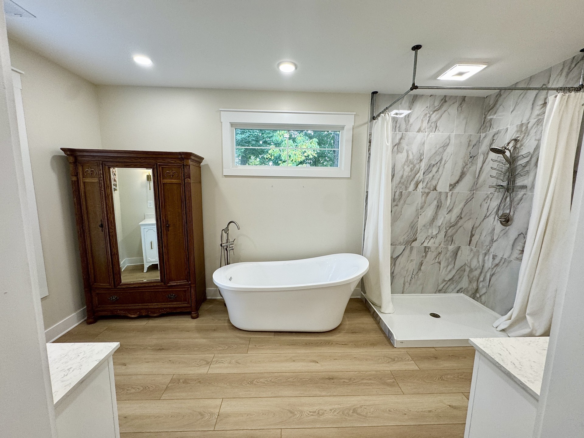 418 Creekmore Road Cottontown, TN 37048 - Photo 11 of 60 a bathroom with a sink a toilet a mirror and shower