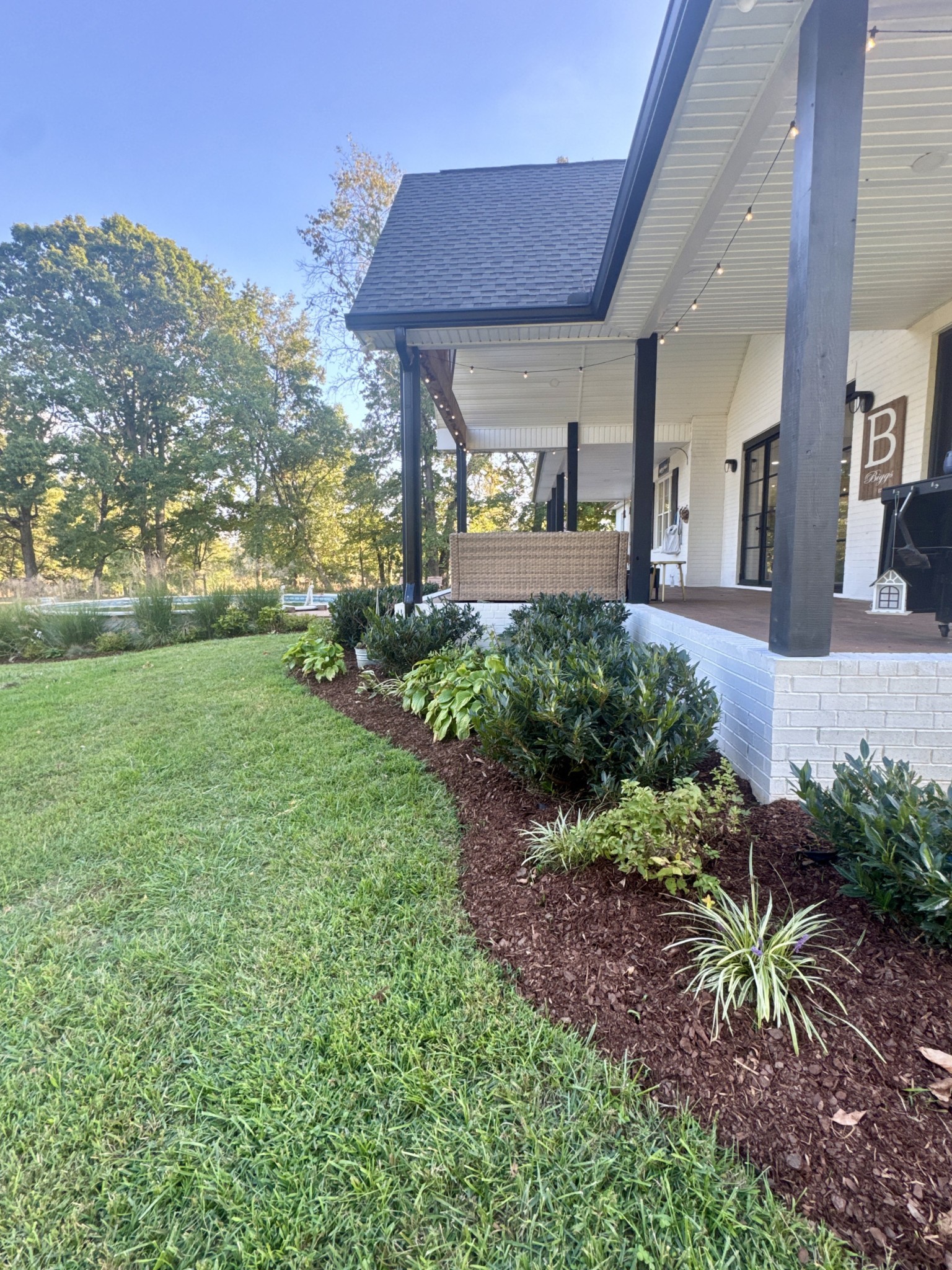 418 Creekmore Road Cottontown, TN 37048 - Photo 24 of 60 a view of a house with yard and a garden