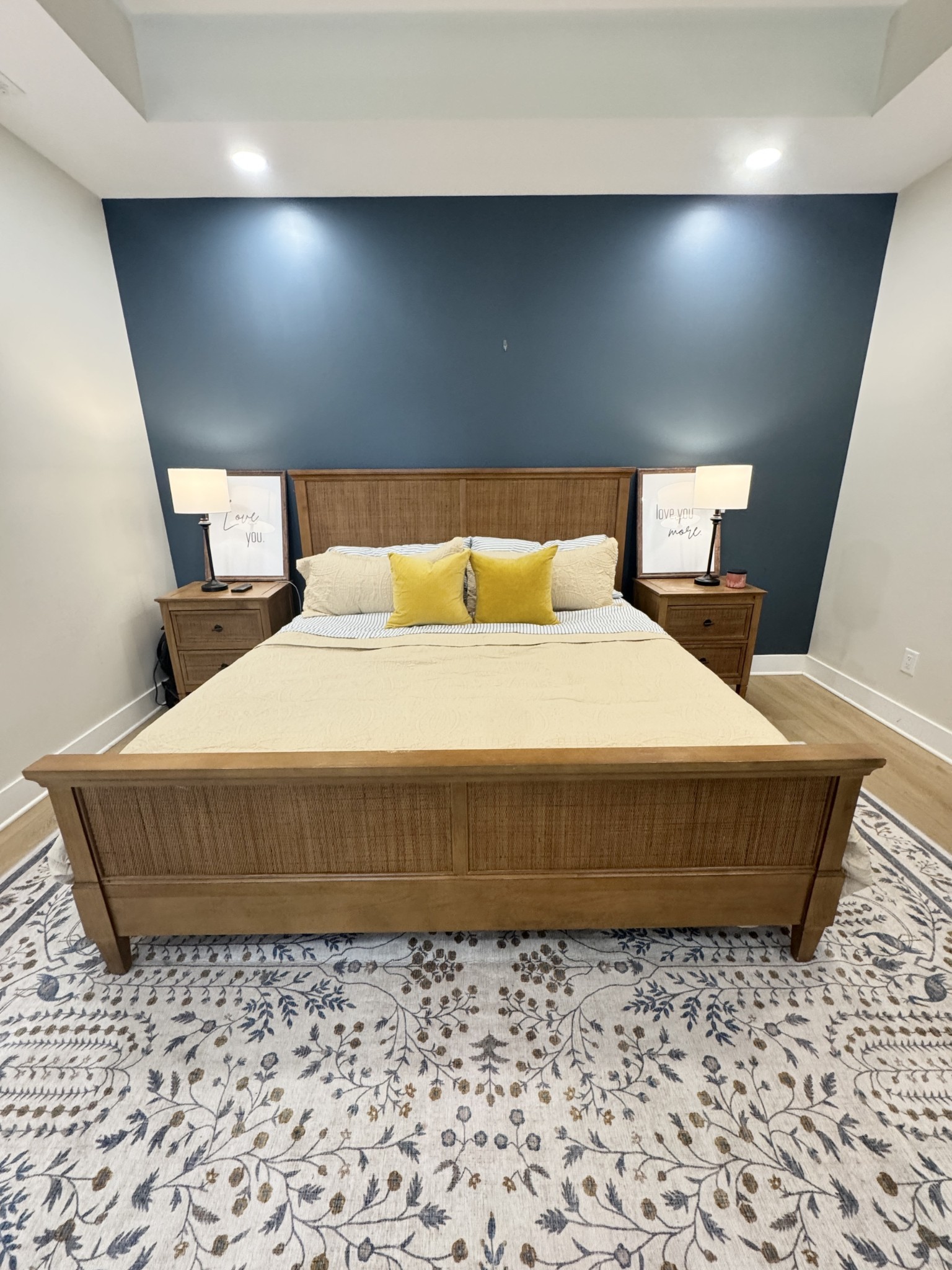 418 Creekmore Road Cottontown, TN 37048 - Photo 36 of 60 a large bed sitting in a bedroom next to a lamp