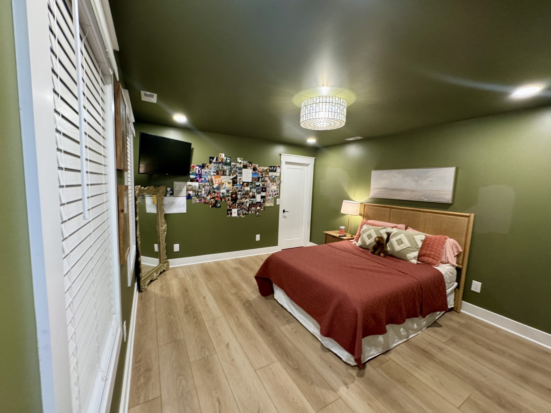 418 Creekmore Road Cottontown, TN 37048 - Photo 40 of 60 a bedroom with a bed and a flat tv screen on dresser