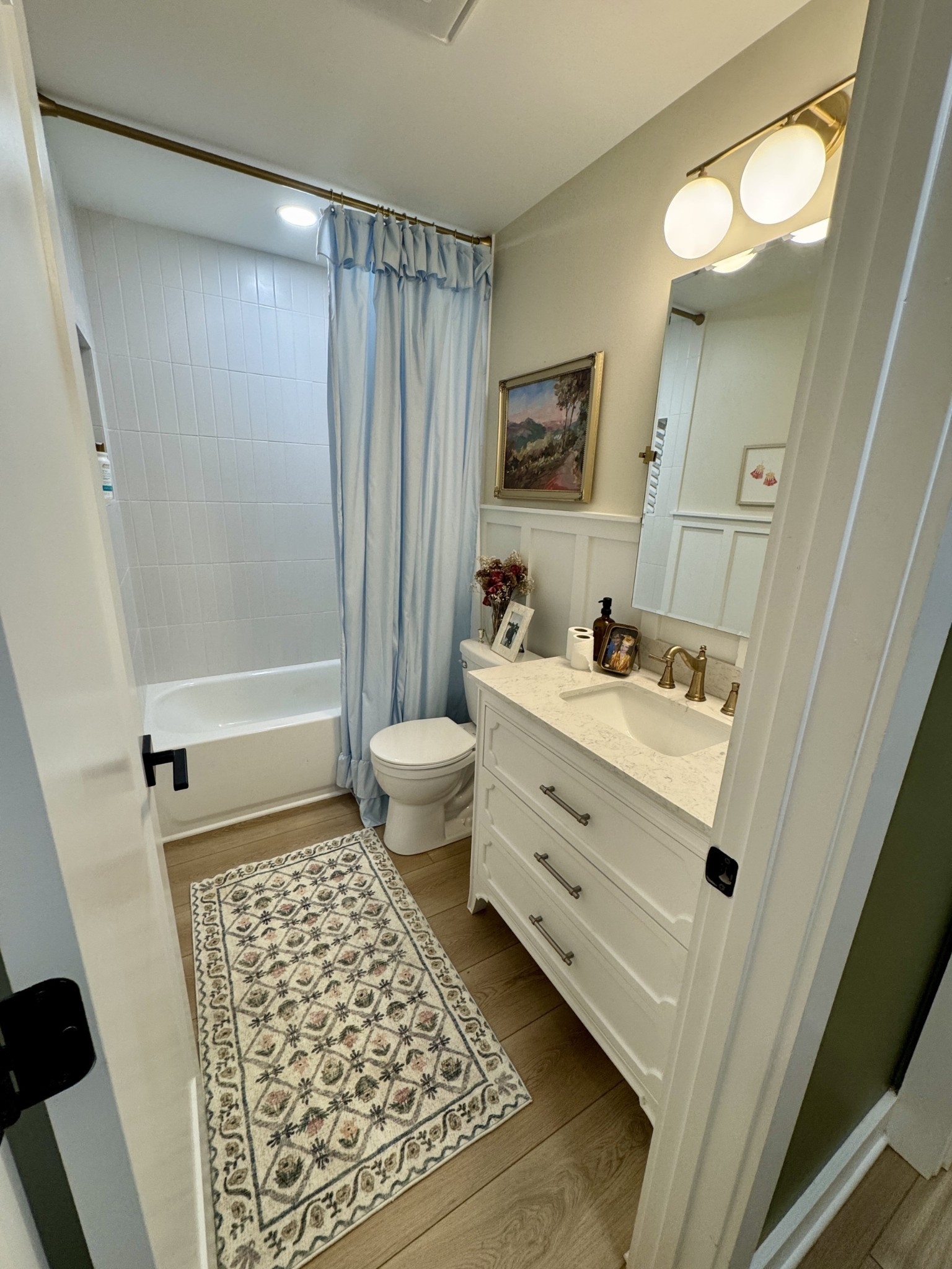 418 Creekmore Road Cottontown, TN 37048 - Photo 42 of 60 a bathroom with a sink a toilet a mirror and shower