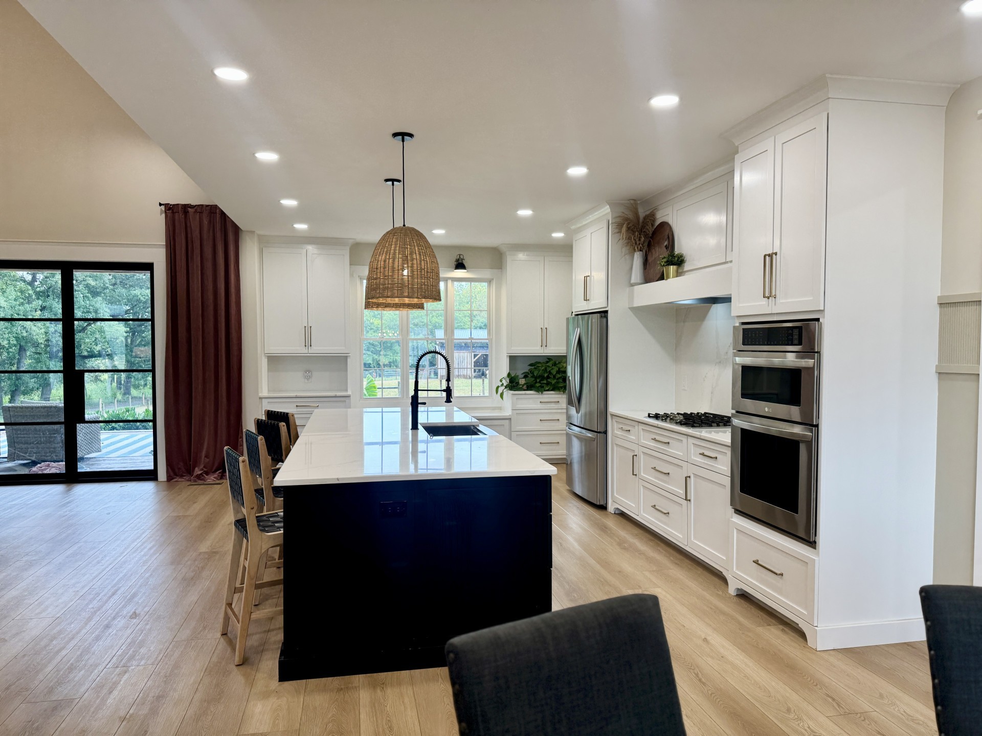 418 Creekmore Road Cottontown, TN 37048 - Photo 5 of 60 a kitchen with stainless steel appliances kitchen island granite countertop a stove a sink and a refrigerator