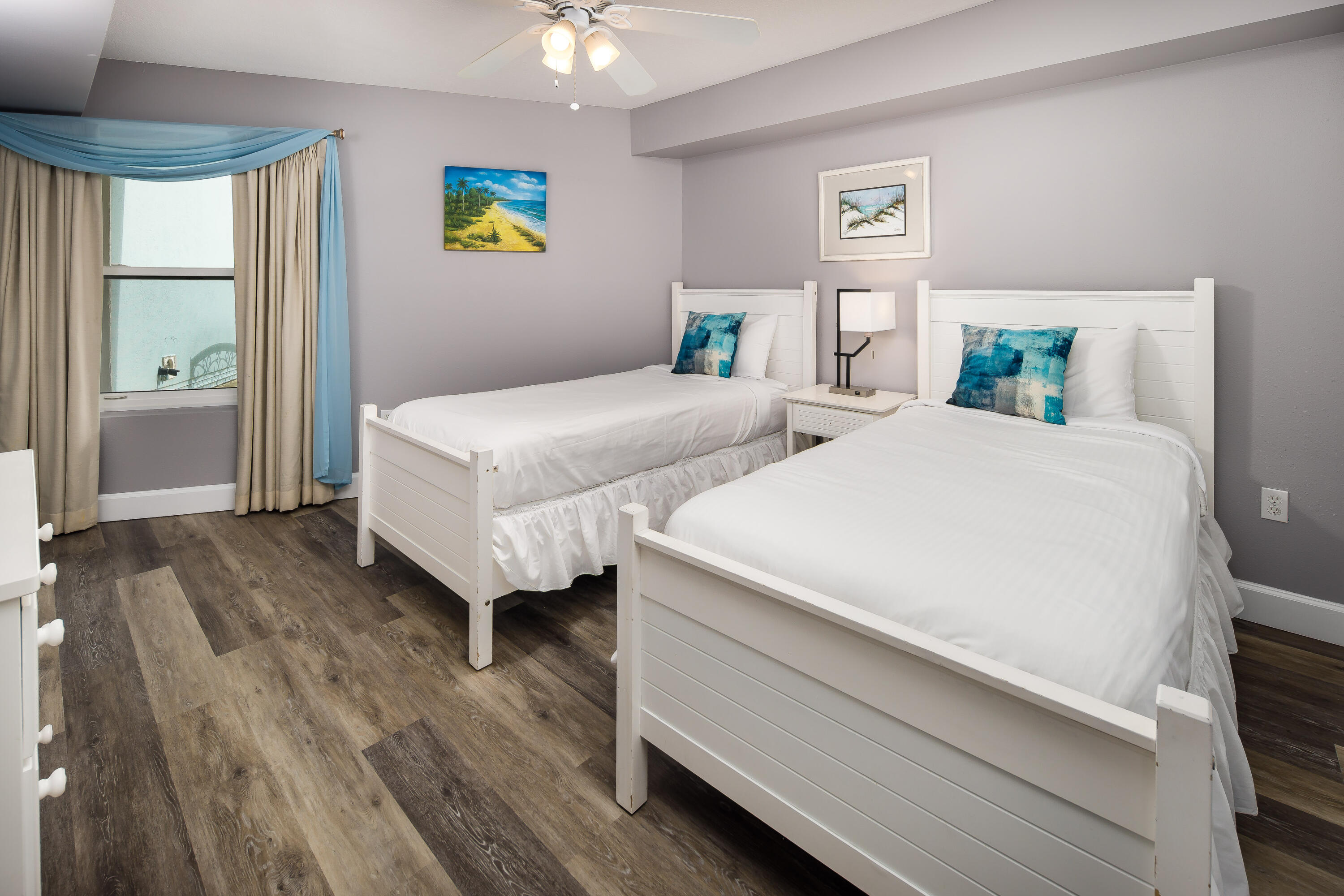 895 Santa Rosa Boulevard, Unit 208 Fort Walton Beach, FL 32548 - Photo 12 of 21 a bedroom with a bed and a window