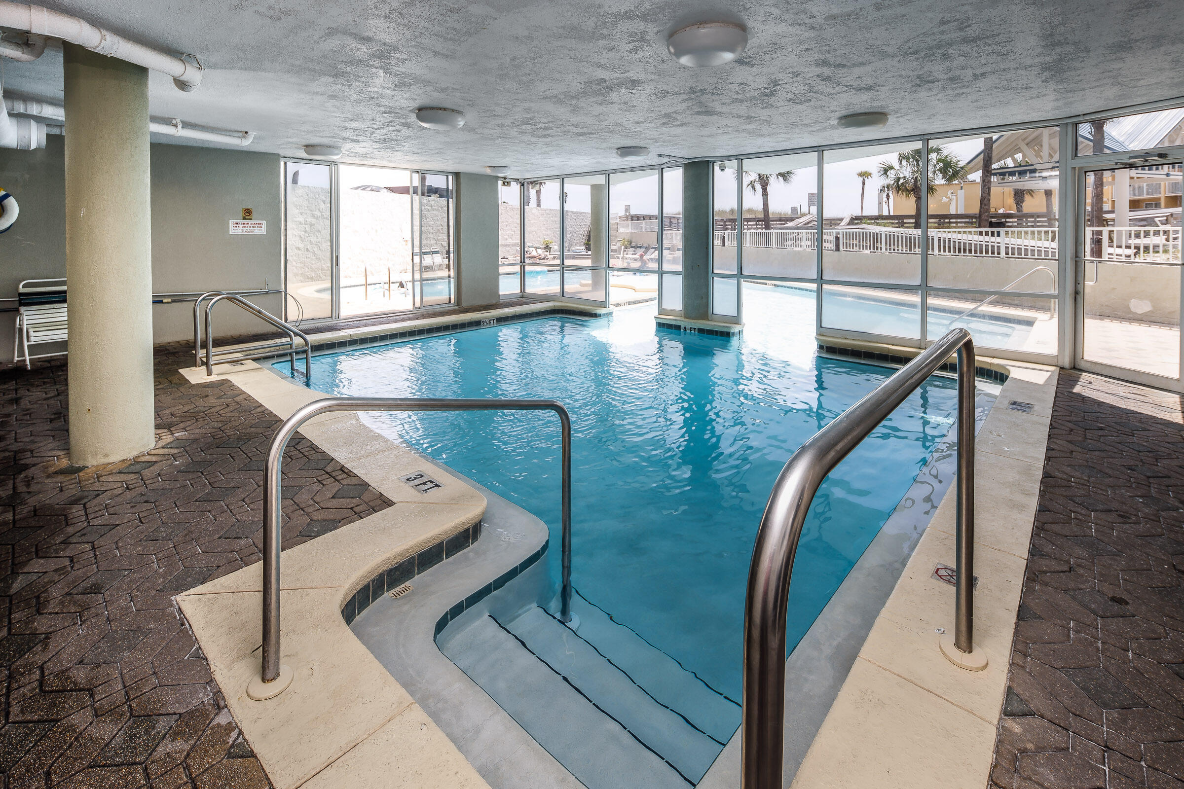 895 Santa Rosa Boulevard, Unit 208 Fort Walton Beach, FL 32548 - Photo 16 of 21 a view of a living room and a balcony