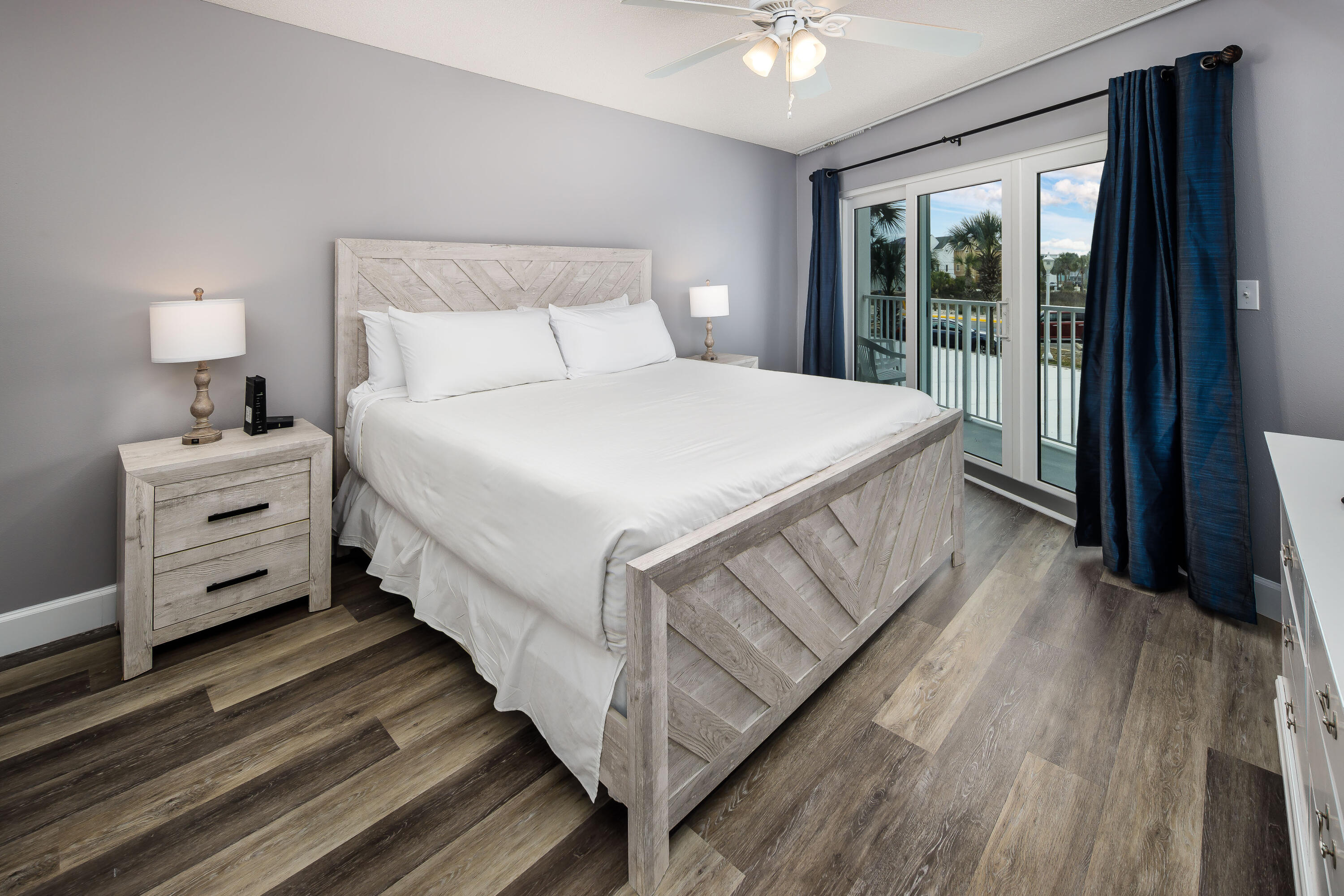 895 Santa Rosa Boulevard, Unit 208 Fort Walton Beach, FL 32548 - Photo 9 of 21 a bedroom with a bed and a flat tv screen