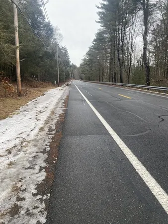 a view of a backyard of the house