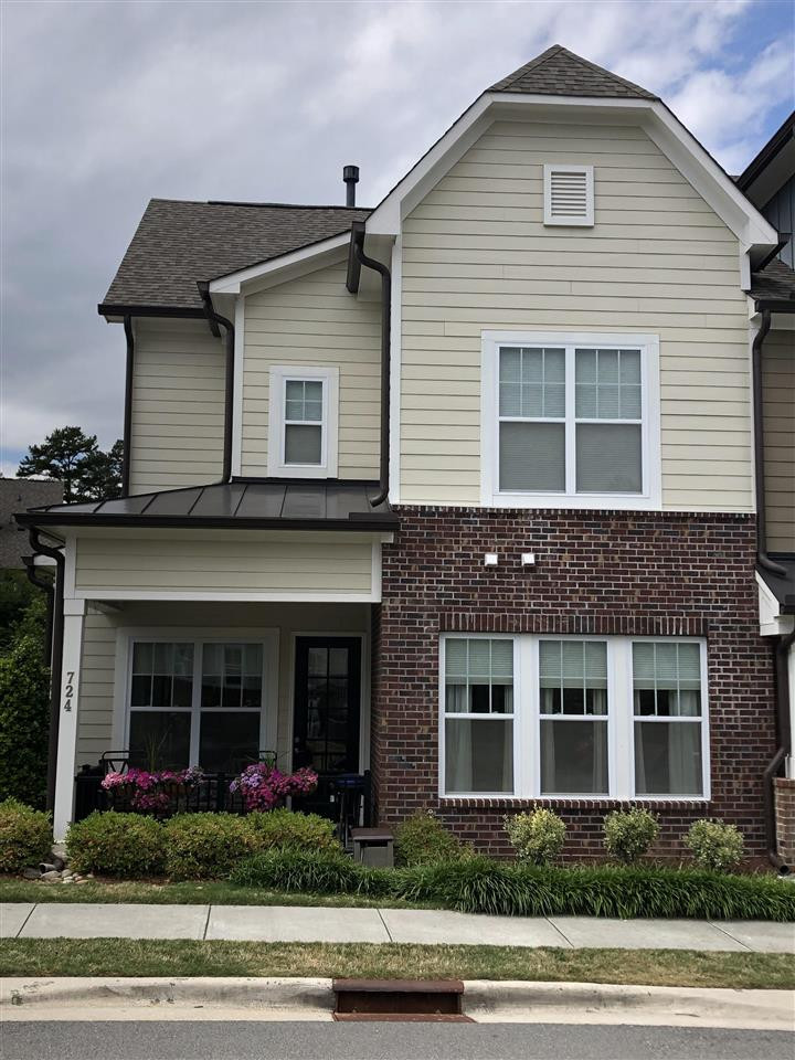 724 Fallon Grove Way Raleigh, NC 27608 - Photo 1 of 3 a front view of a house with a yard