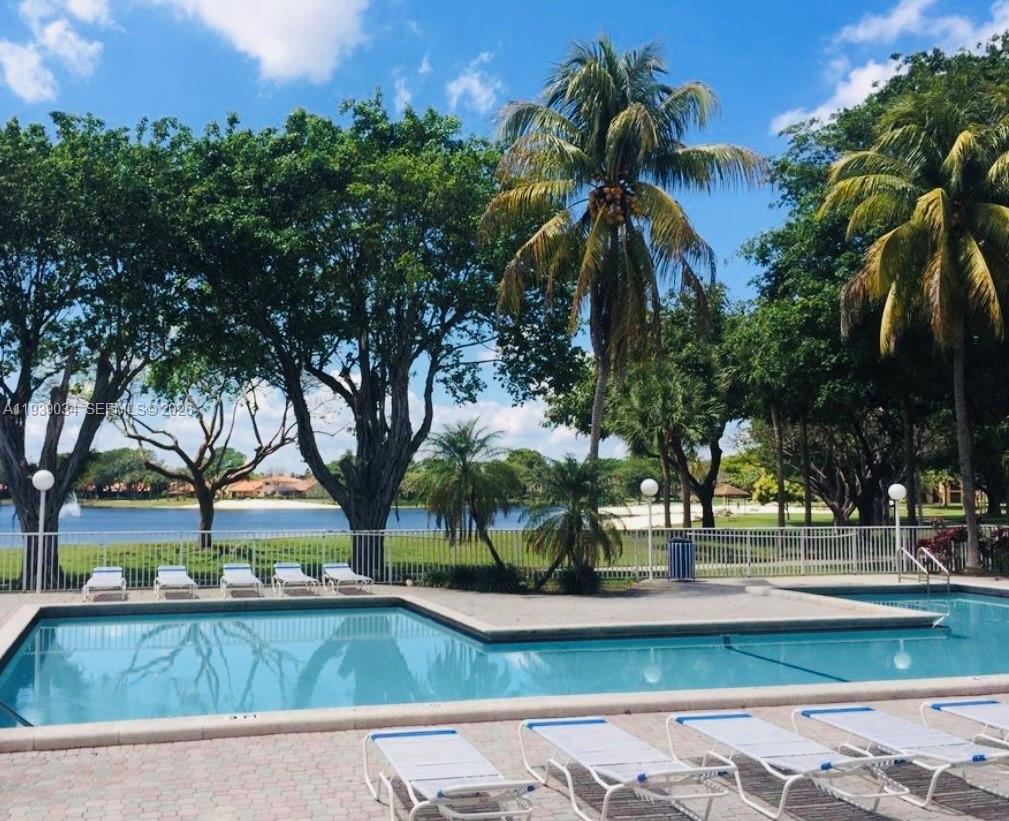 15340 Southwest 106th Terrace, Unit 819 Miami, FL 33196 - Photo 13 of 16 a view of swimming pool