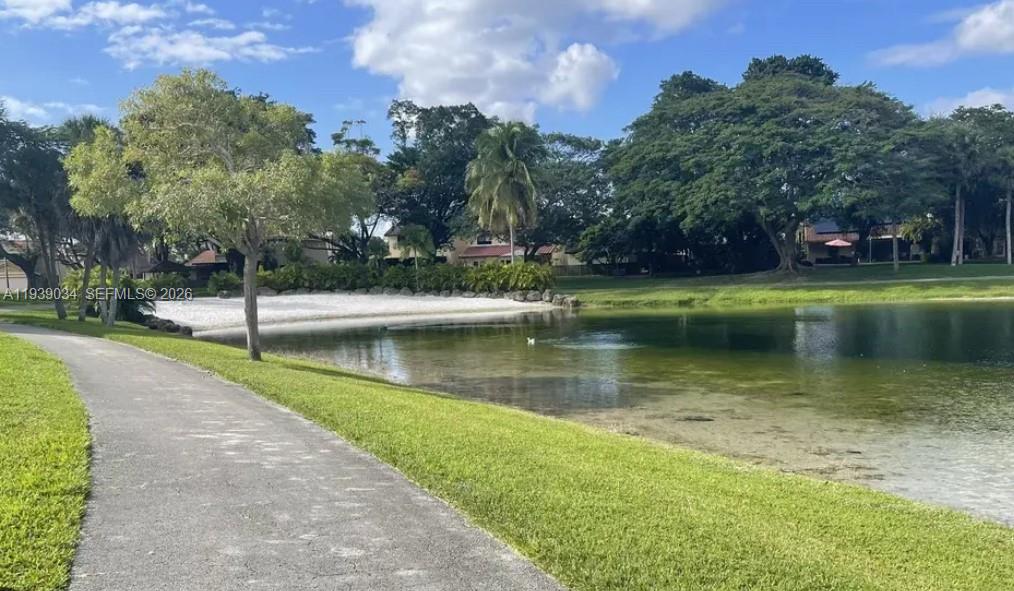 15340 Southwest 106th Terrace, Unit 819 Miami, FL 33196 - Photo 16 of 16 a view of a lake with houses