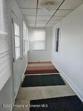 a room with bed and window