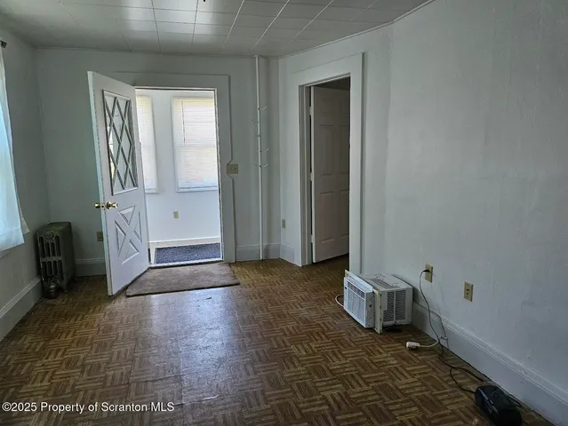 an empty room with a door