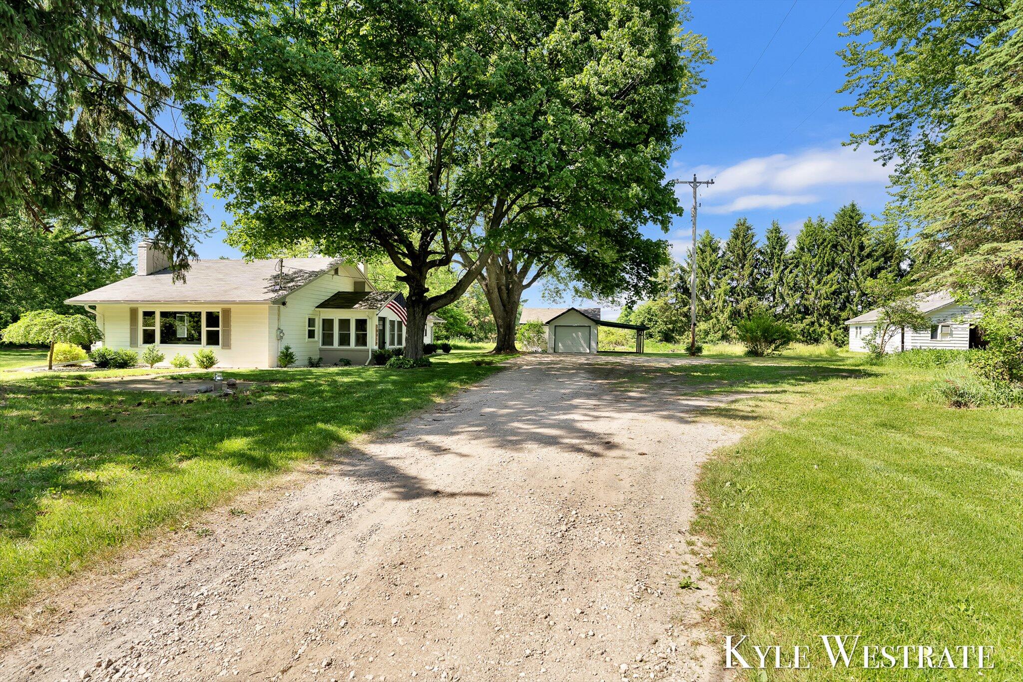 10019 10 Mile Road Northeast Rockford, MI 49341 - Photo 2 of 32 03-ELY07167