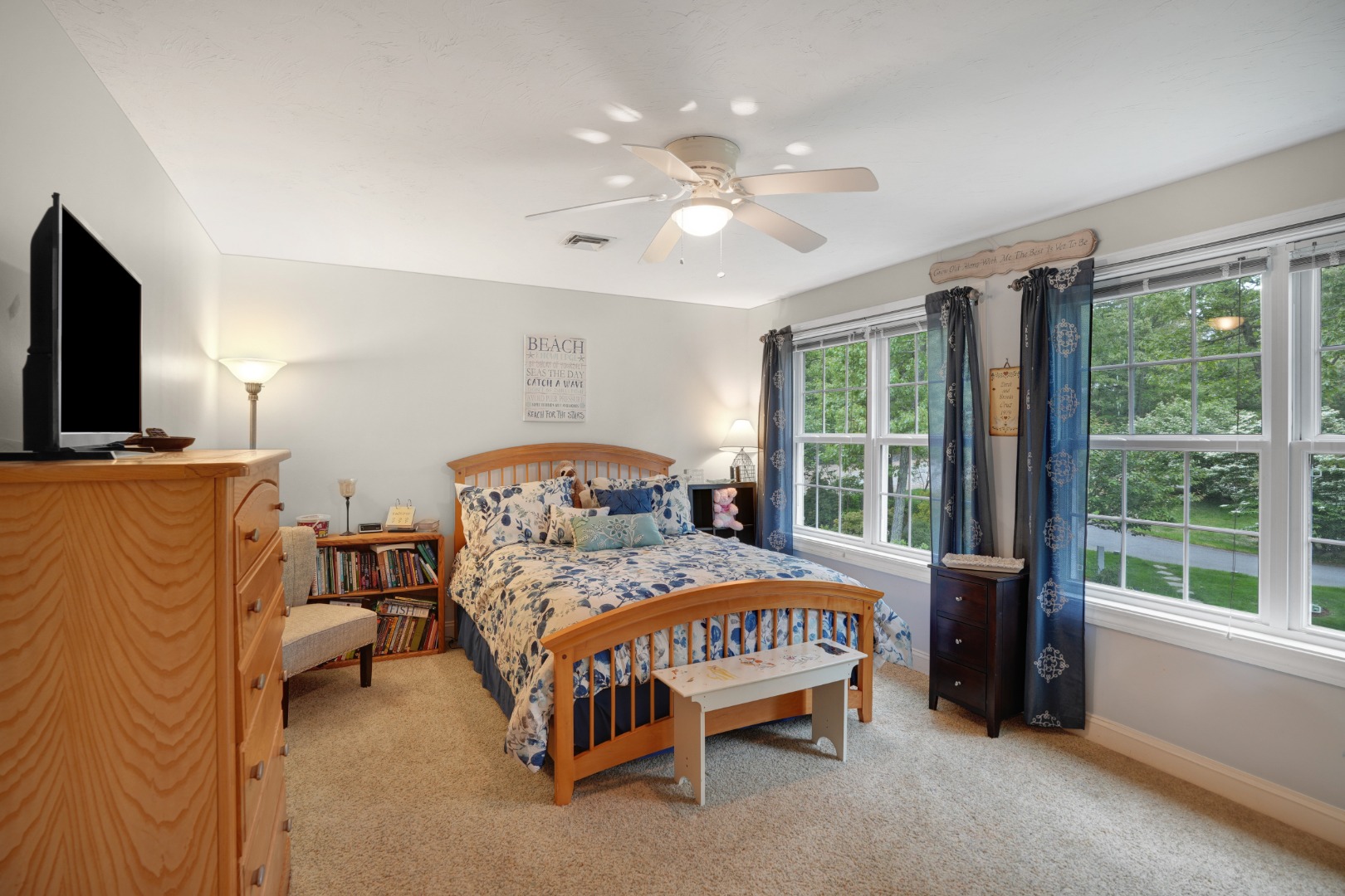 8 Fresh Pond Road Oak Bluffs, MA 02557 - Photo 14 of 40 a bedroom with a bed and a flat tv screen