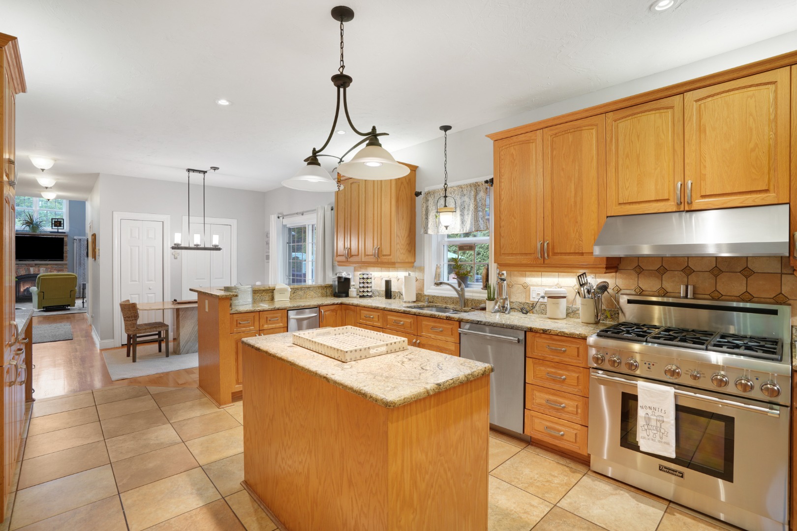 8 Fresh Pond Road Oak Bluffs, MA 02557 - Photo 5 of 40 a kitchen with stainless steel appliances granite countertop a stove a sink a oven and a refrigerator