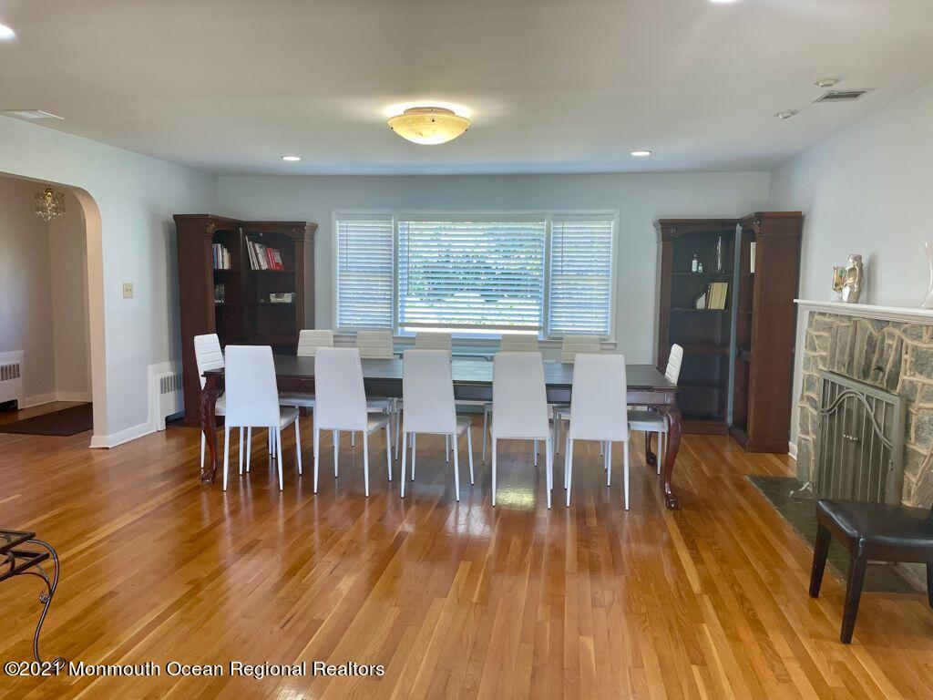 21 Berg Avenue Elberon, NJ 07740 - Photo 5 of 17 a view of a dining room with furniture window and wooden floor