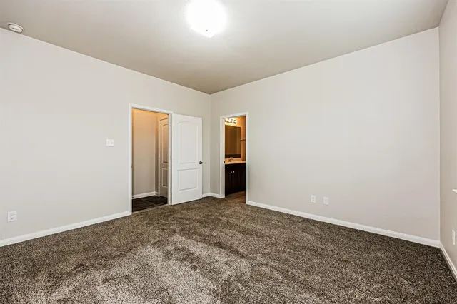 a view of hallway with natural light
