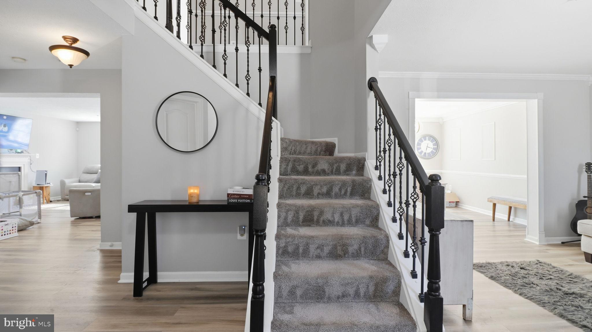 7105 Friendship Road Clinton, MD 20735 - Photo 13 of 42 Inviting entryway with elegant staircase.
