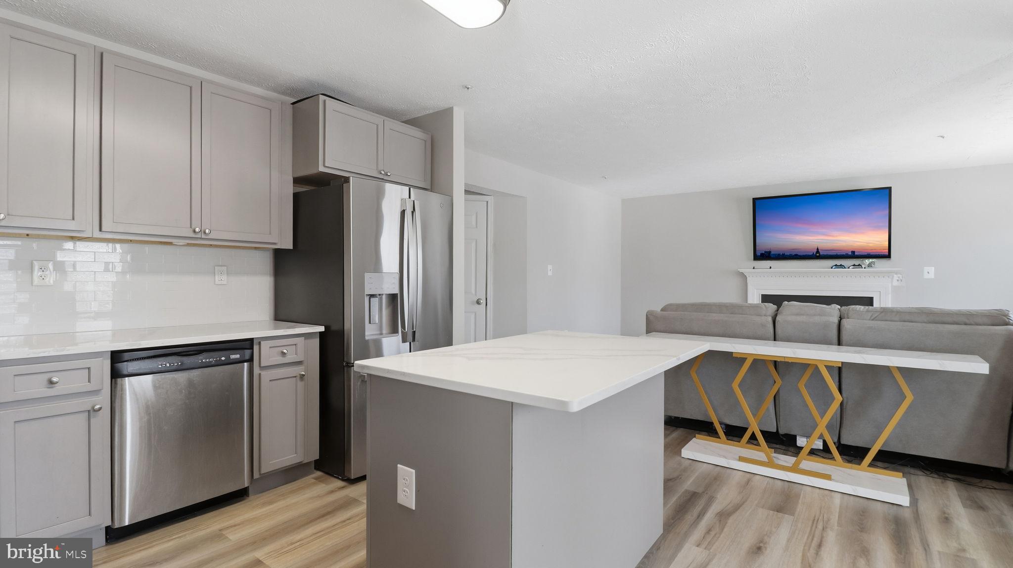7105 Friendship Road Clinton, MD 20735 - Photo 16 of 42 Modern kitchen with sleek finishes.