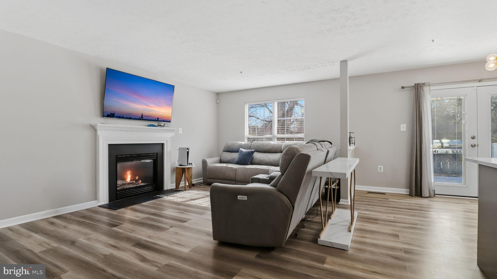 7105 Friendship Road Clinton, MD 20735 - Photo 17 of 42 Cozy living space with serene sunset view.