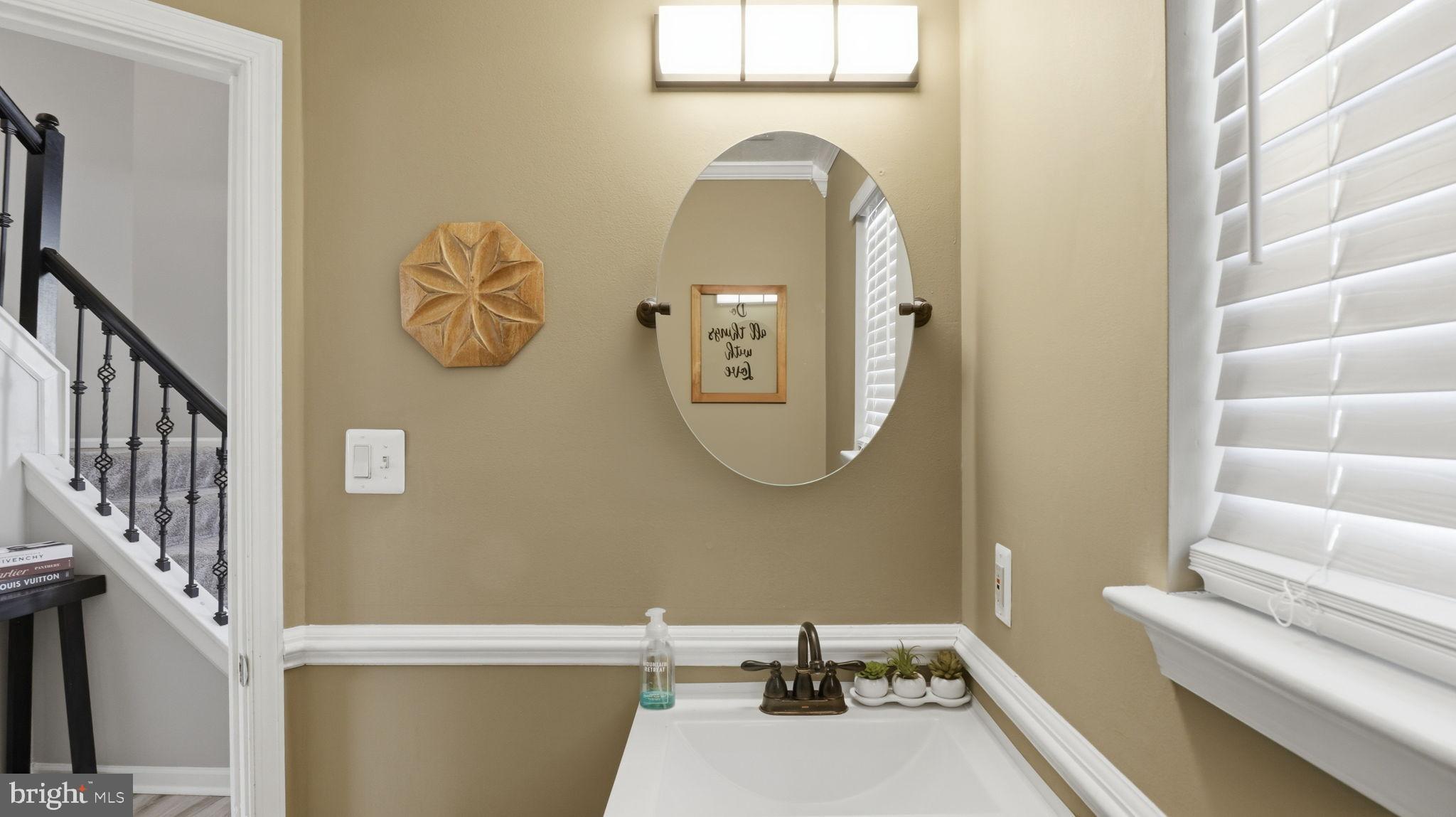 7105 Friendship Road Clinton, MD 20735 - Photo 19 of 42 Charming half-bath with modern accents.