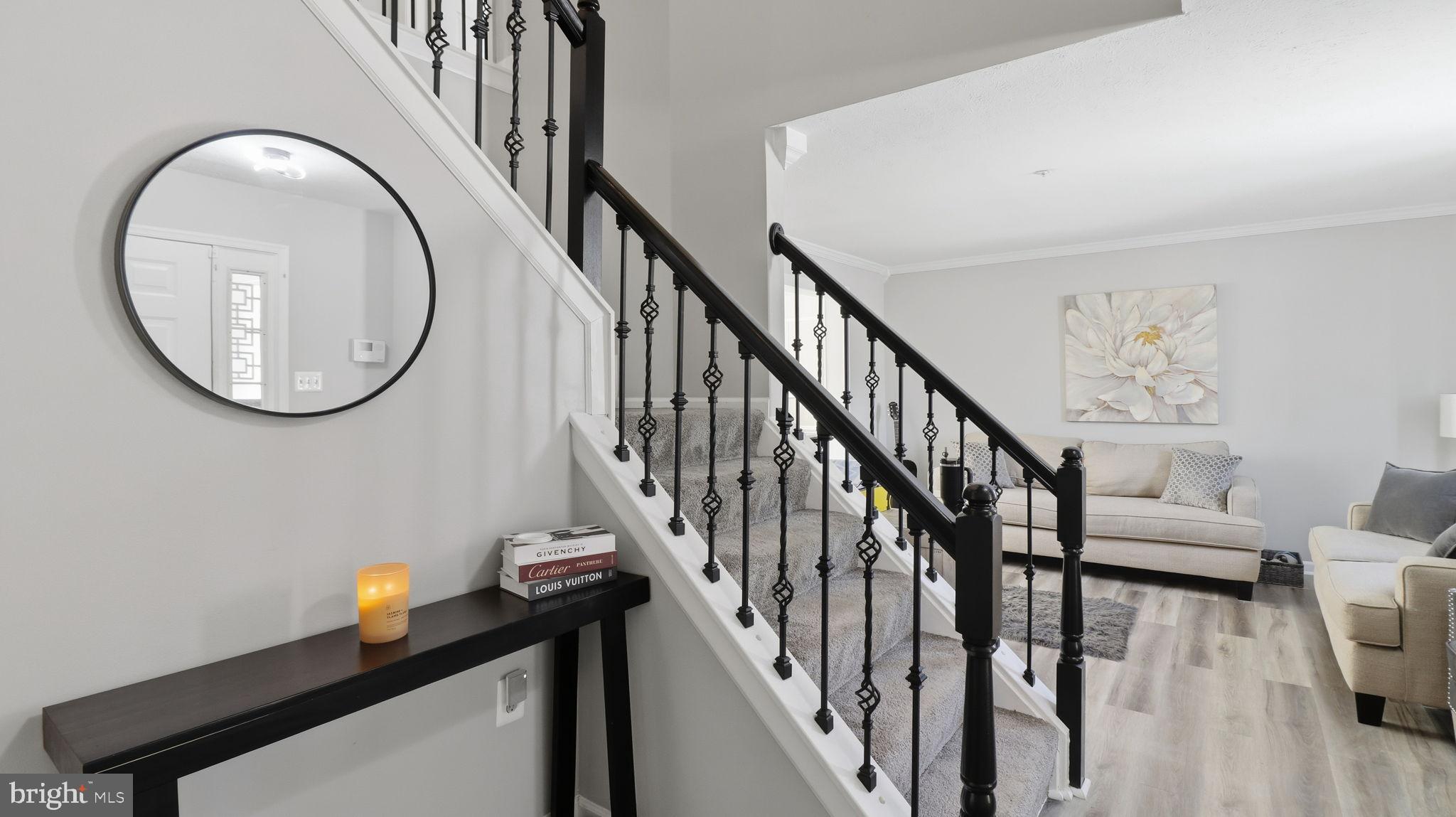 7105 Friendship Road Clinton, MD 20735 - Photo 20 of 42 Inviting entryway with elegant staircase.