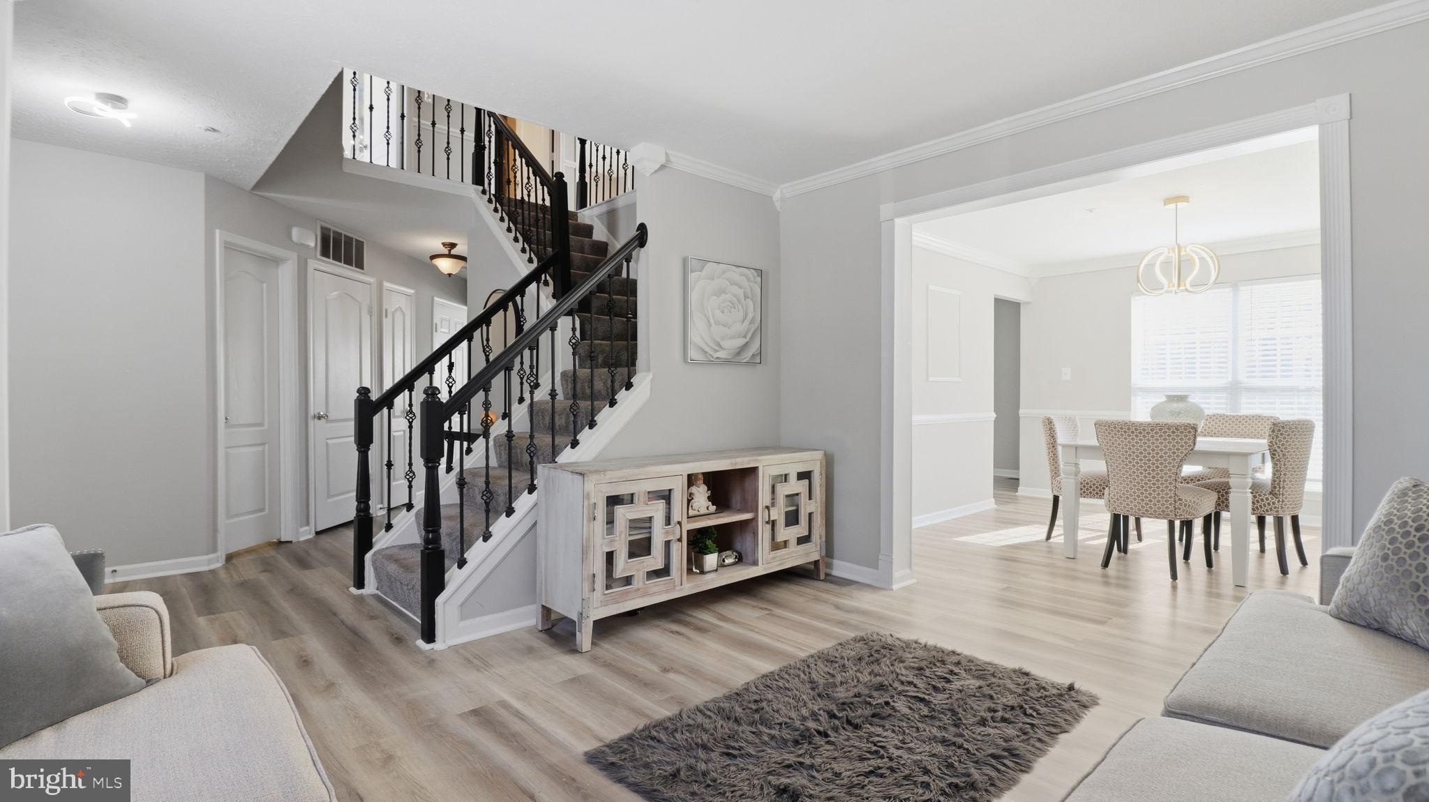 7105 Friendship Road Clinton, MD 20735 - Photo 2 of 42 Inviting entryway with elegant staircase.