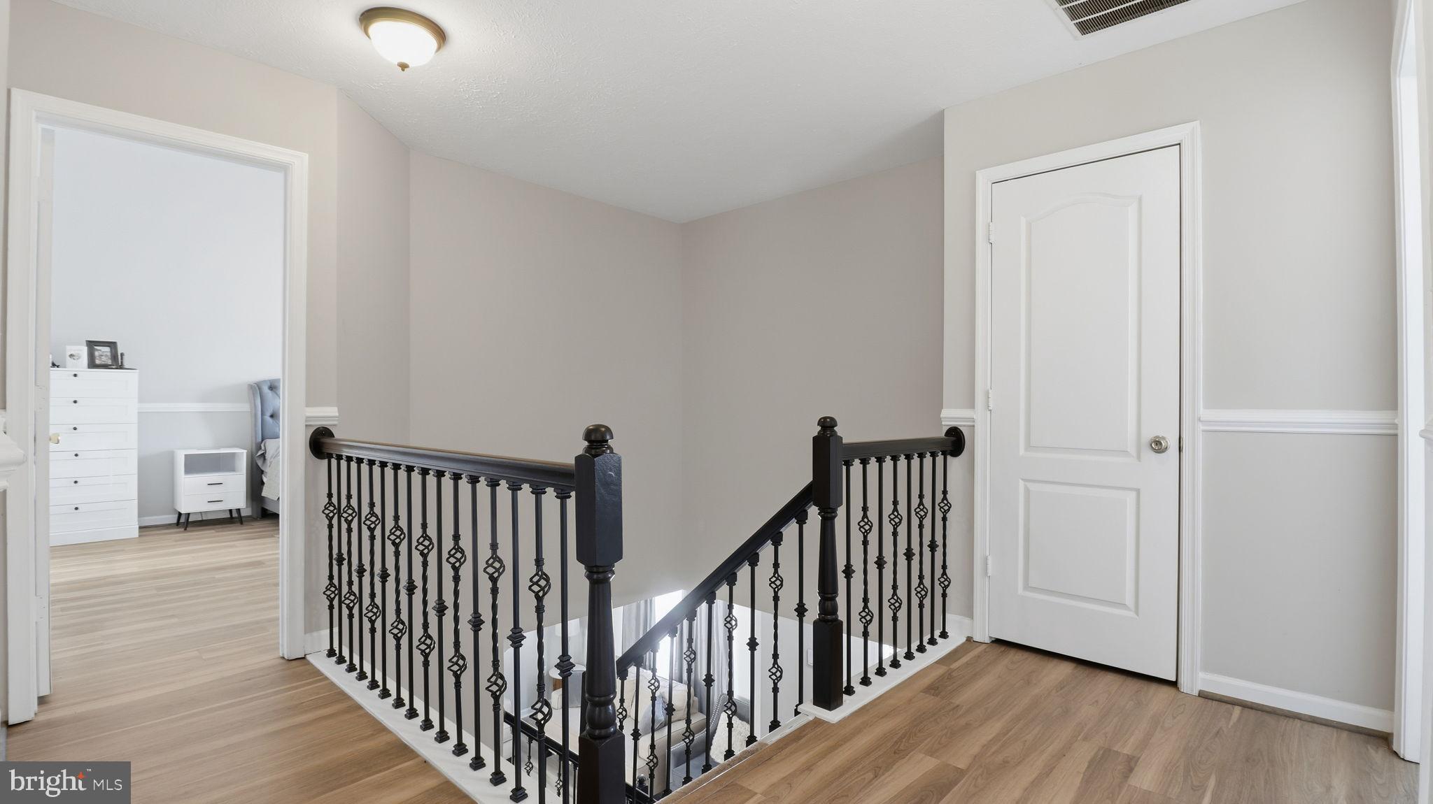 7105 Friendship Road Clinton, MD 20735 - Photo 21 of 42 Elegant staircase with modern accents.