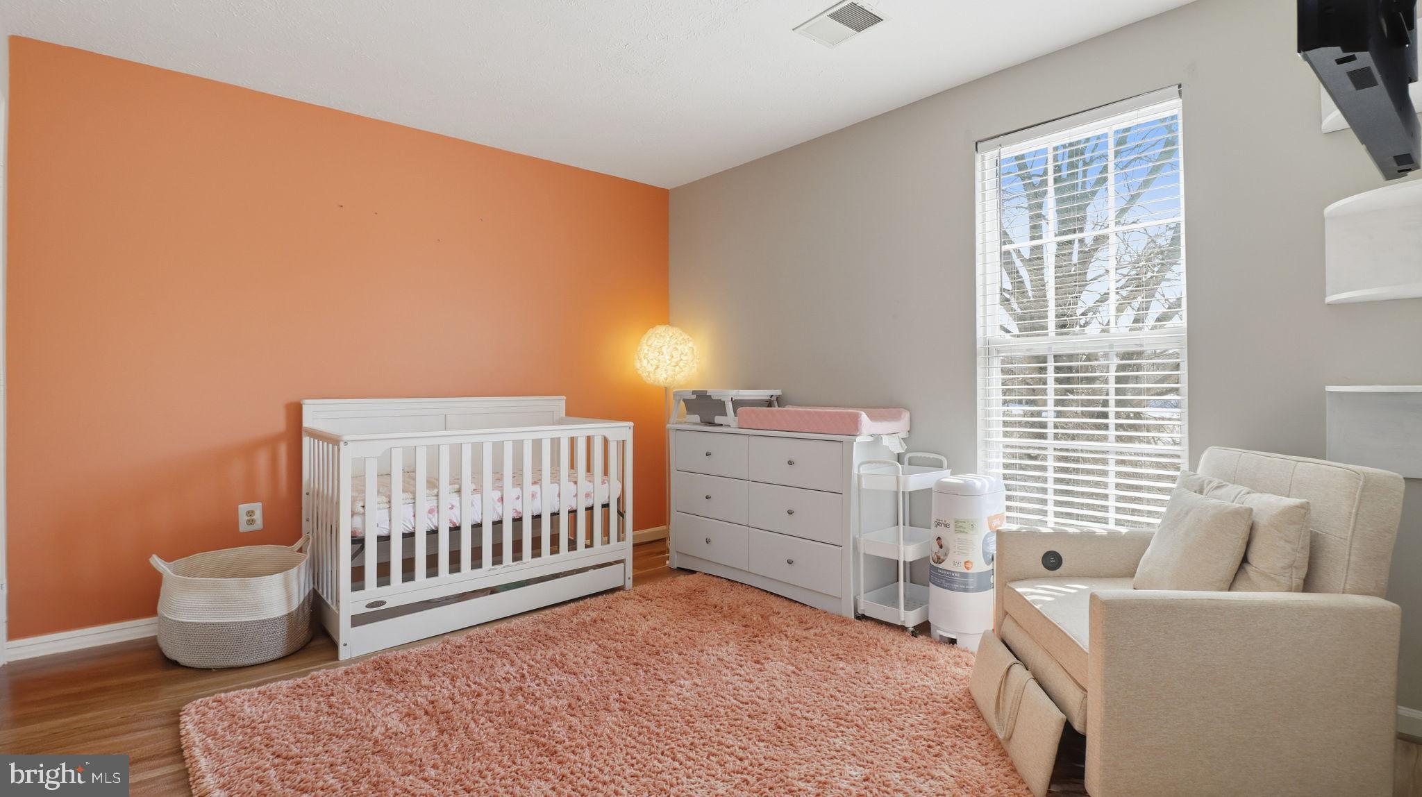 7105 Friendship Road Clinton, MD 20735 - Photo 25 of 42 Bright and cozy nursery with playful hues.