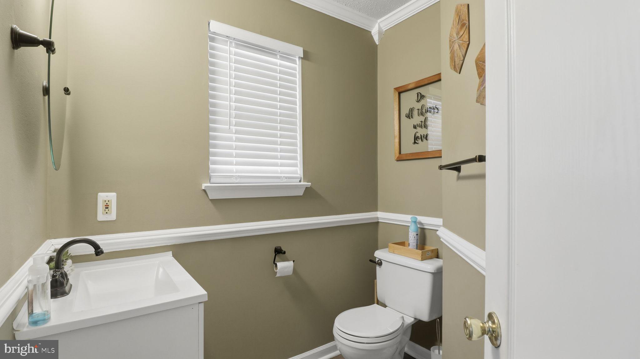 7105 Friendship Road Clinton, MD 20735 - Photo 34 of 42 Charming half-bath with modern accents.