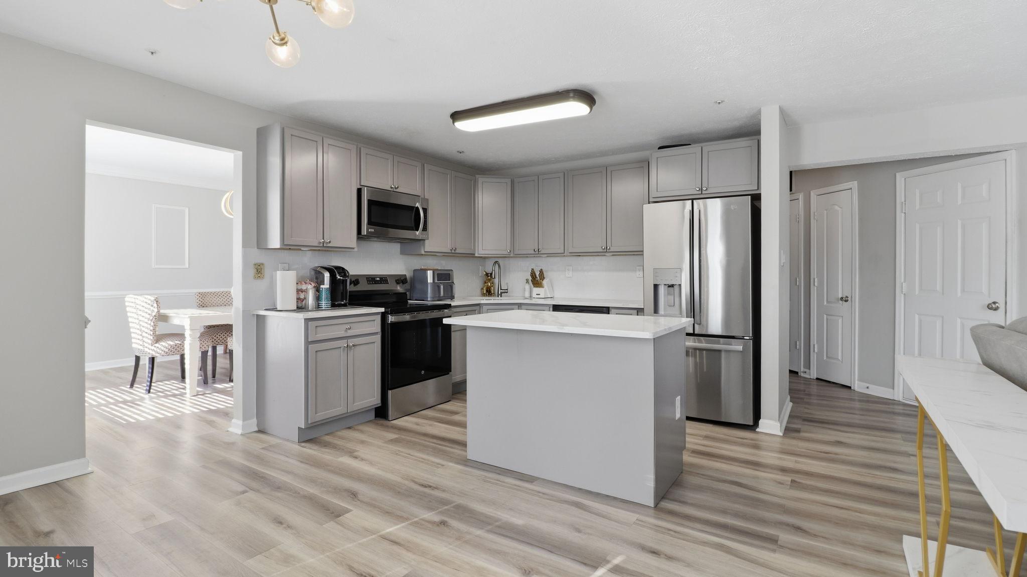 7105 Friendship Road Clinton, MD 20735 - Photo 5 of 42 Modern kitchen with sleek finishes.