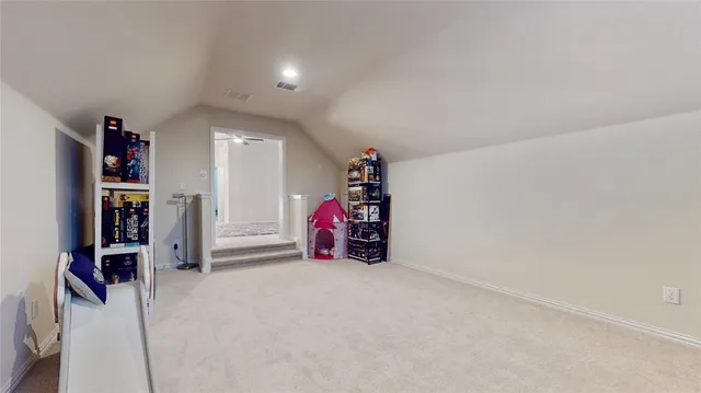 a en suite bathroom with a double vanity sink a mirror and a shower