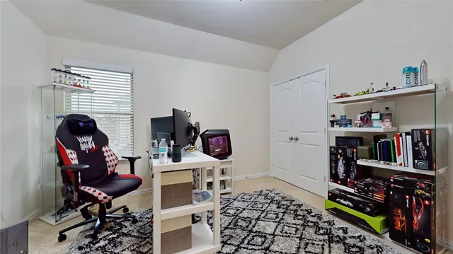 a view of a workspace with furniture and toys