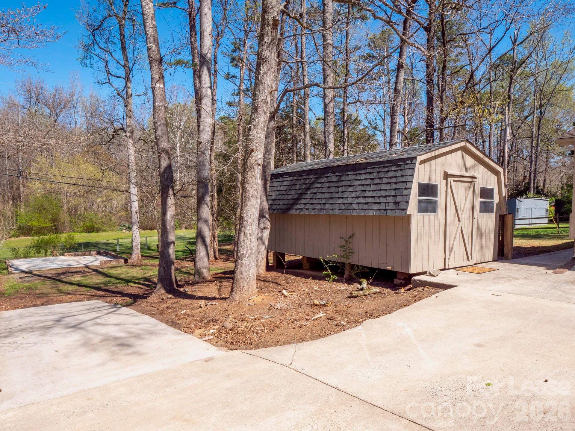 3917 Singletree Road Mint Hill, NC 28227 - Photo 13 of 47 a view of a entrance gate of a house