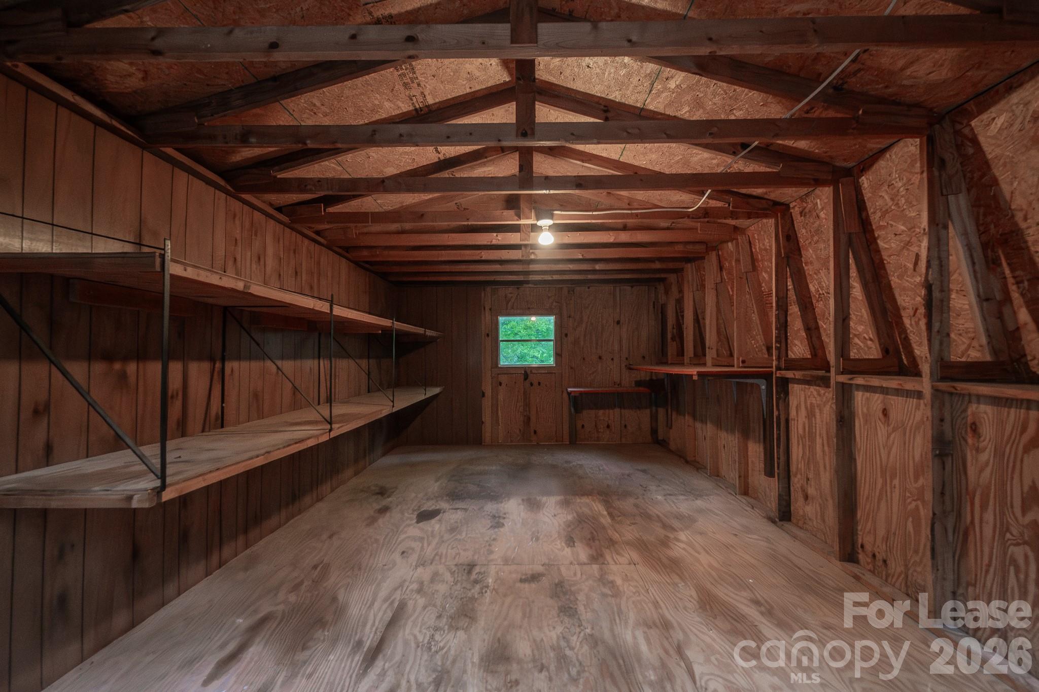 3917 Singletree Road Mint Hill, NC 28227 - Photo 14 of 47 a view of an empty room with wooden floor